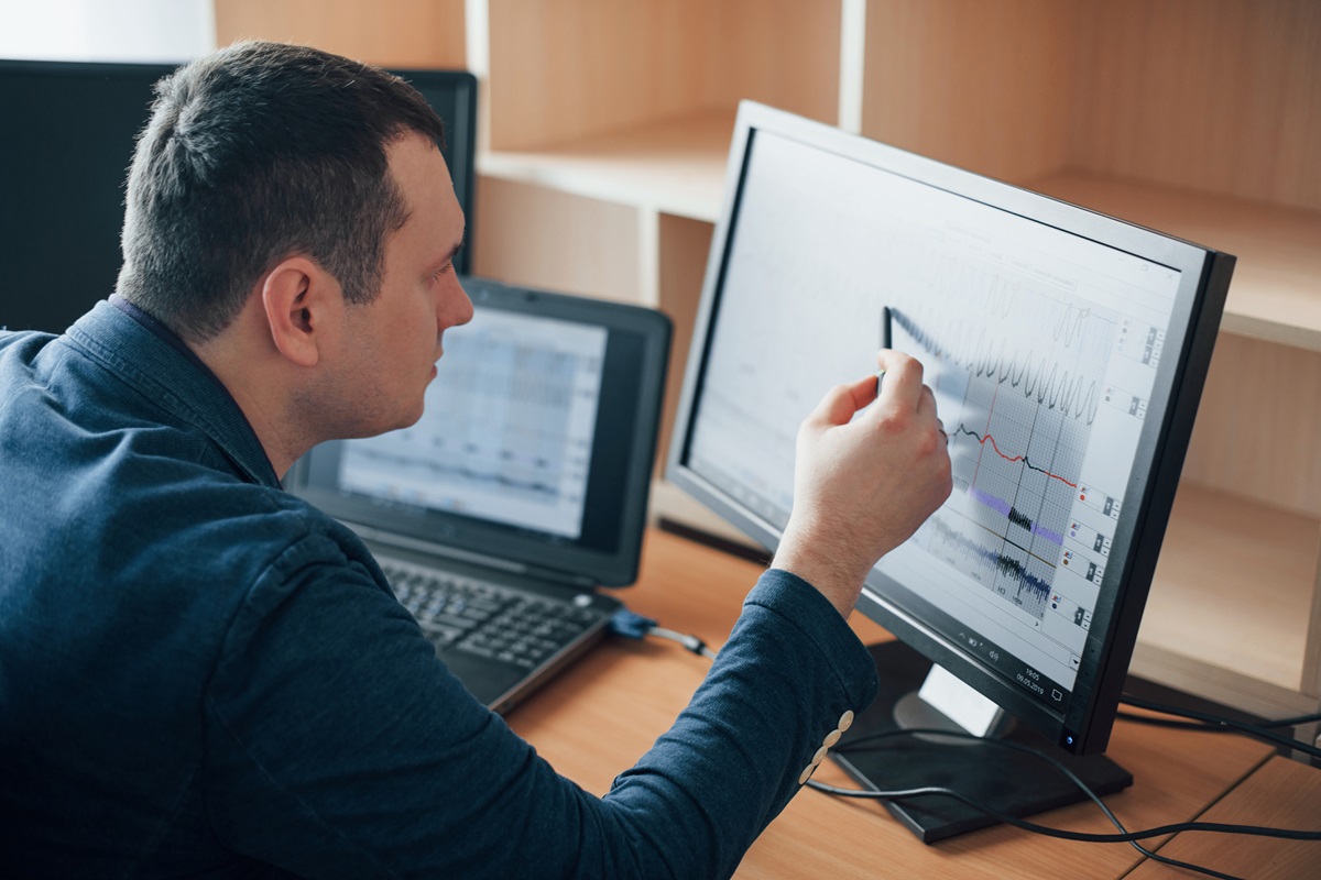 Businessman using EHS audit software