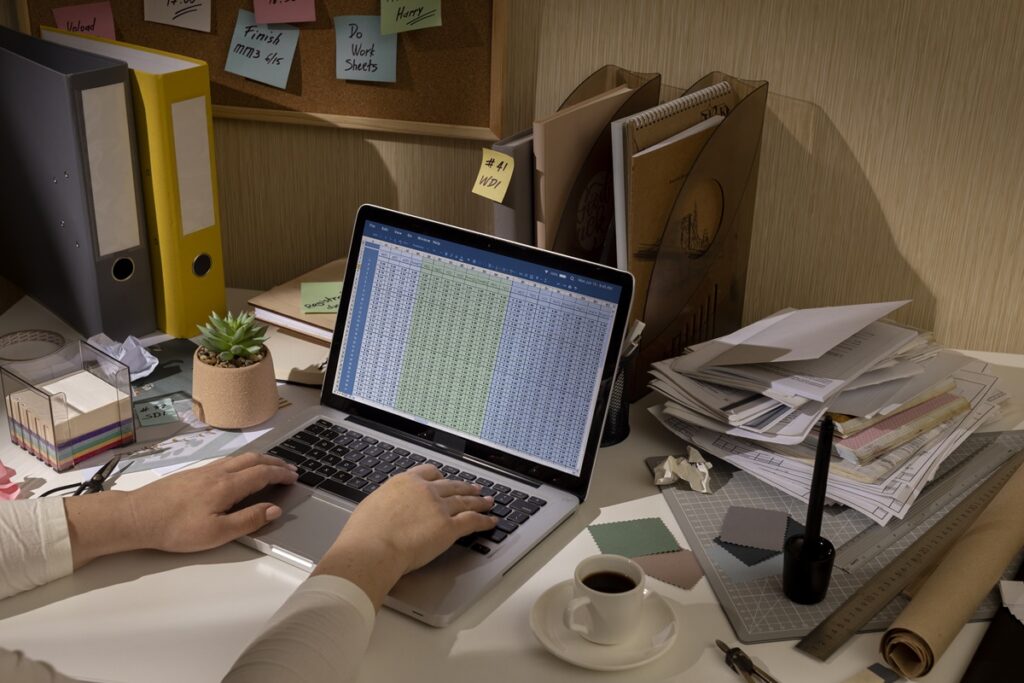 Businessman using recordkeeping software