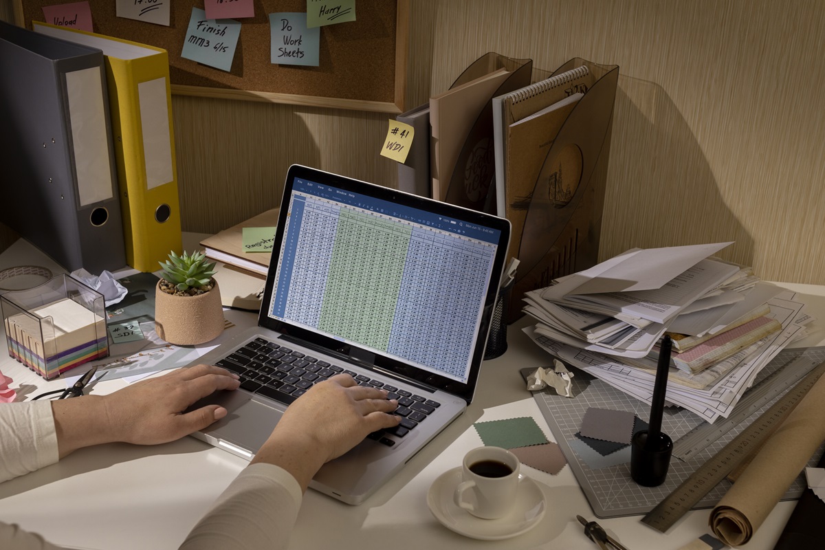 Businessman using recordkeeping software