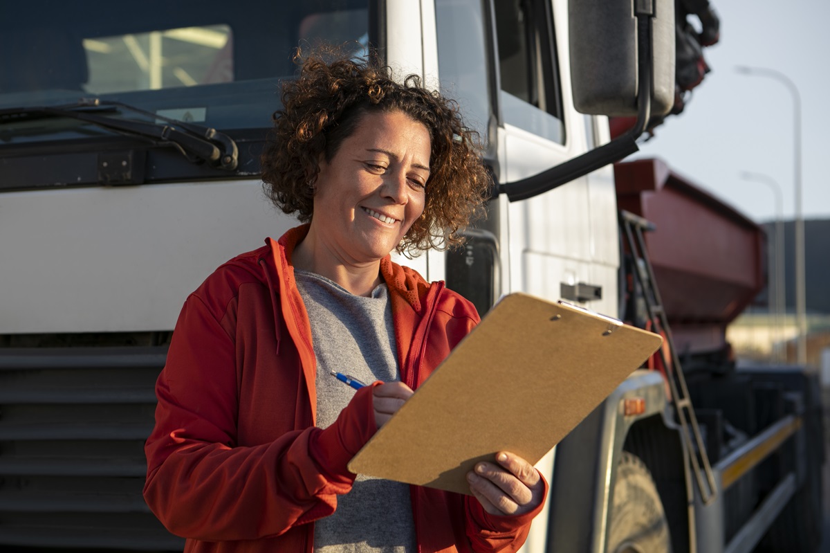 Professional driver filling out a DQ file