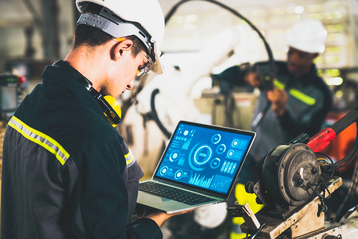 Technician using a safety management system