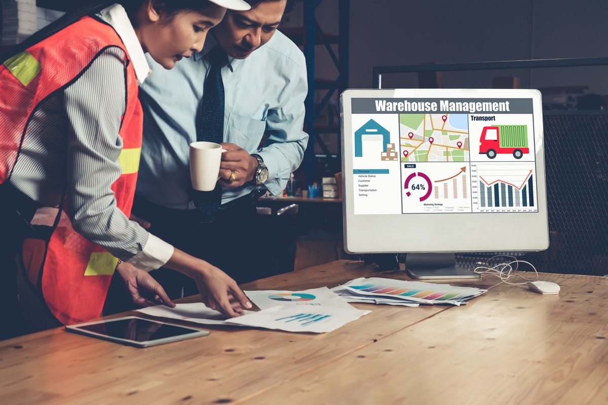 Warehouse workers using an EHS system
