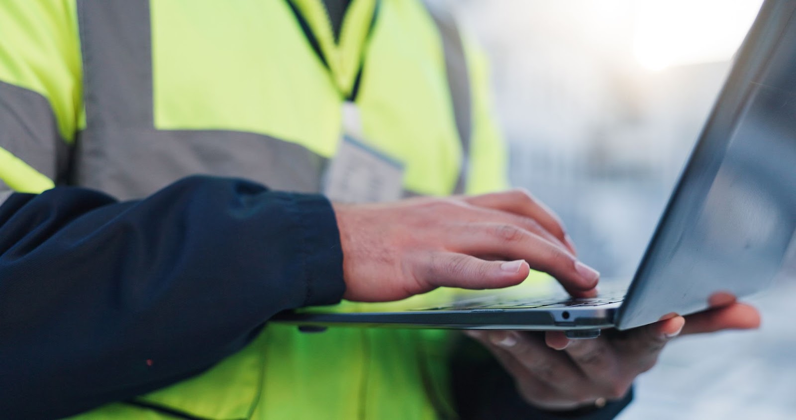 Safety Officer holding a laptop